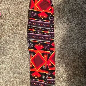 LuLaRoe Tall&Curvy leggings vibrant reds, orange, yellow, purples, grays, black